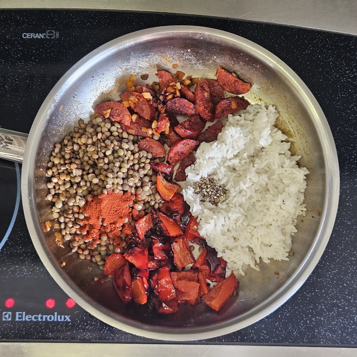 Step 5 of Chorizo and Lentil Rice with Roasted Red Pepper