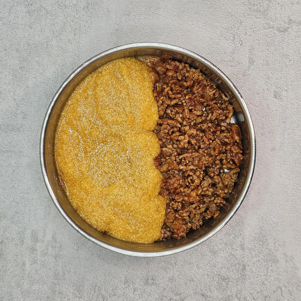 Step 6 of Spiced Beef and Pumpkin Tamal Pie Slice