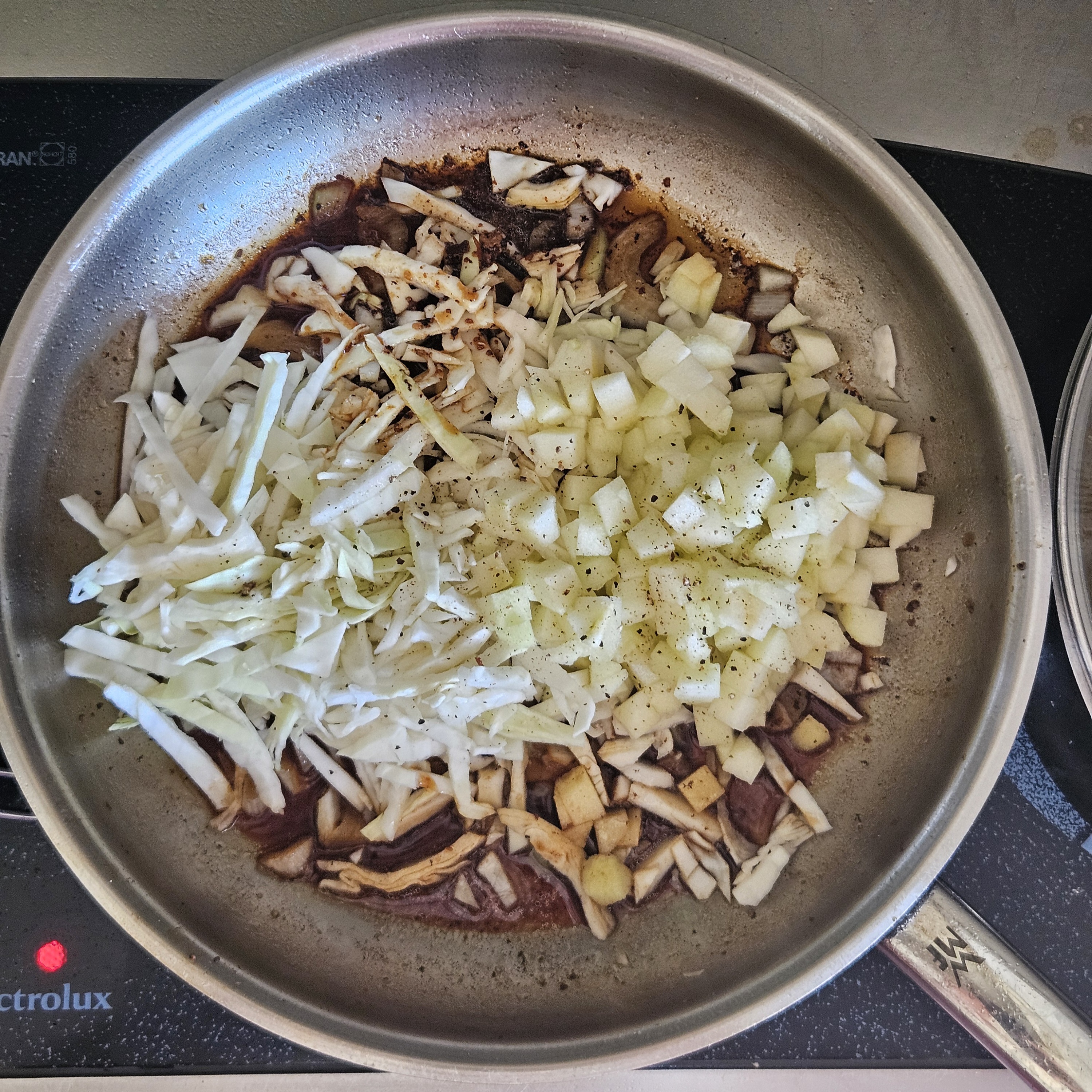 Step 4 of Mustard Pork Chops with Braised Cabbage and Apple
