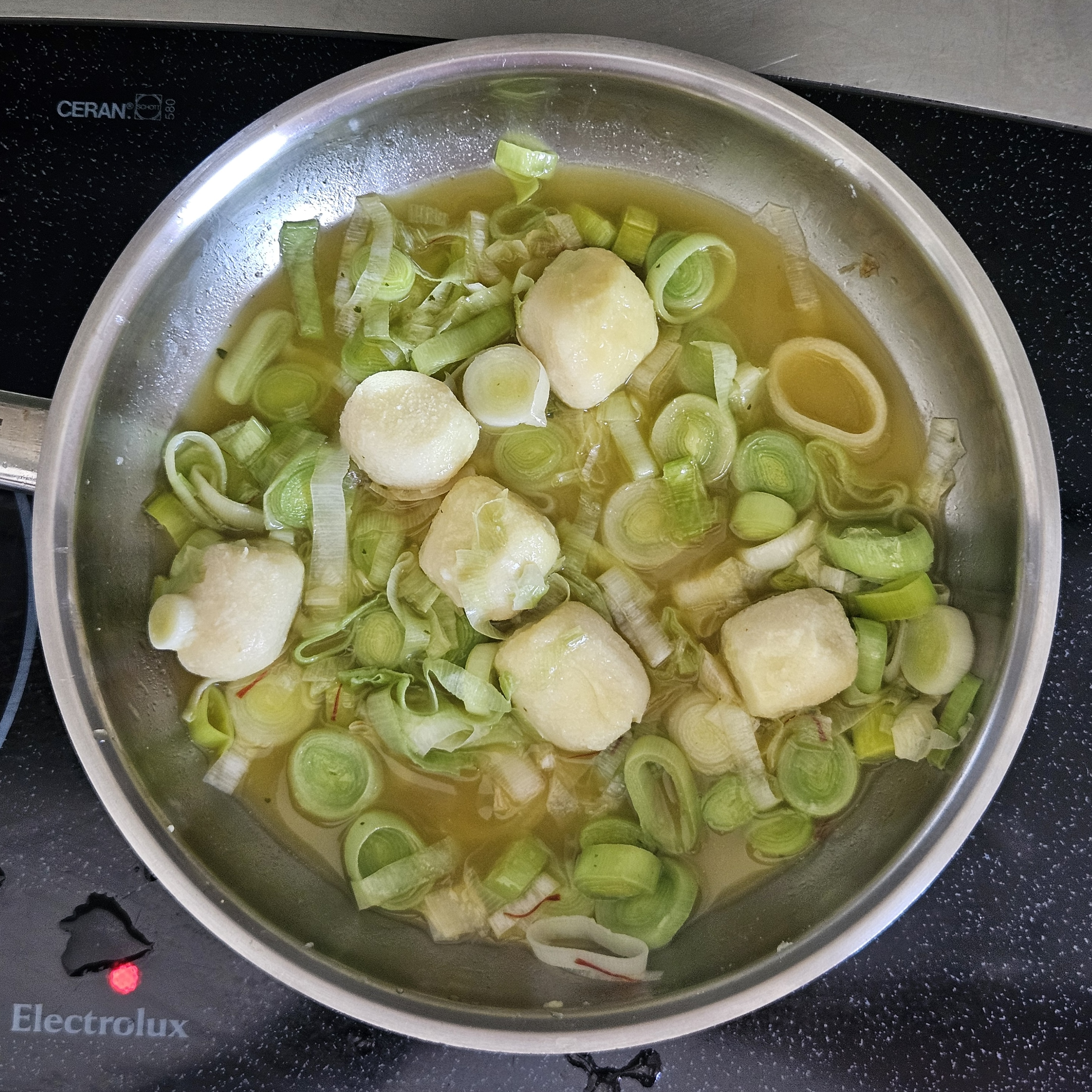 Step 3 of Saffron Potato Gnocchi with Alpine Cheese and Leeks